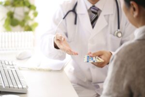 doctor prescribing medication-assisted treatment
